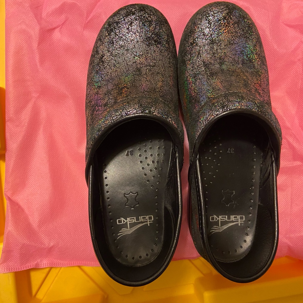 Dansko clogs, W37, cracked black and iridescent pattern. Great condition